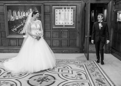 First look of bride and groom at their winter wedding in London.