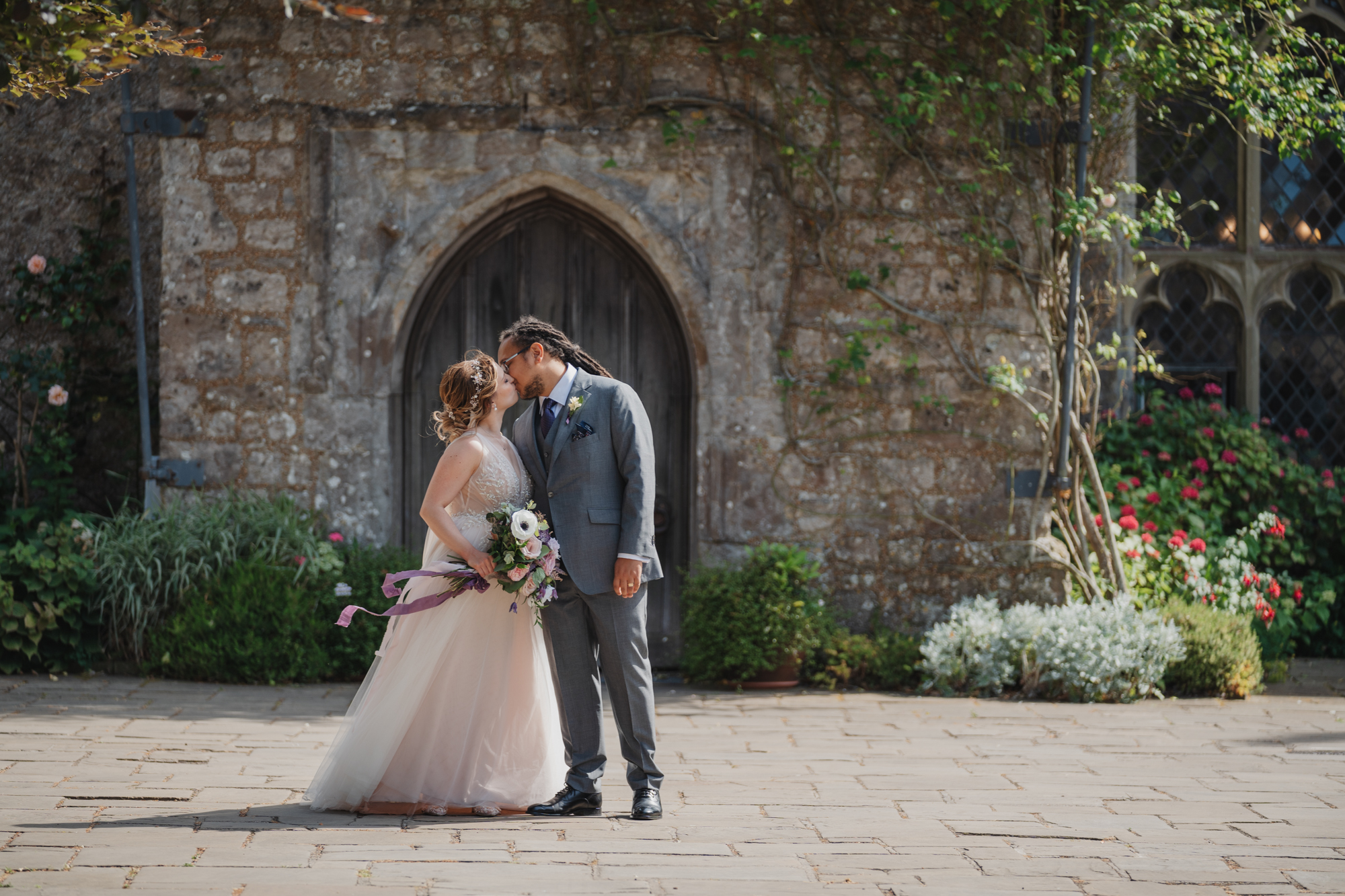 Bride and her dad walking to her wedding ceremony at Lympne Castle